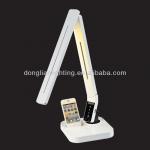 White color LED desk lamp with Iphone 4 charging socket