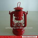 Red hanging kerosene hurricane lanterns for camping